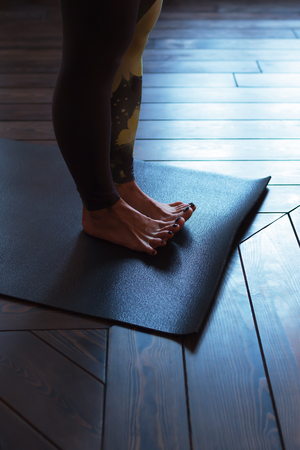 Preparation for the practice of yoga, exercises against flat feet, warm foot musclesの写真素材