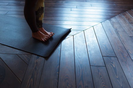 Preparation for the practice of yoga, exercises against flat feet, warm foot musclesの写真素材