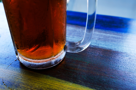 Close up photo of glass of black tea. Fresh drink