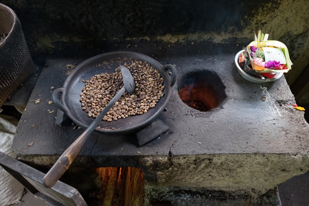 Roasting of coffee beans in traditional way. Up viewの写真素材