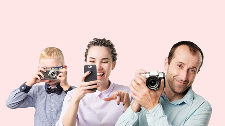 Group of people kid woman and man holding photocamera. Concept of hobby and study in photo school