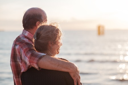 elderly couple rest near seashore. Concept of true love and long time togetherの写真素材