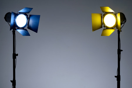 Equipment for photo studios and fashion photography. Gray background and reflector. Ready to shoot photo scheme concept.の写真素材