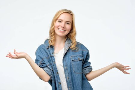 Young beautiful happy woman looking at camera with smile.の写真素材