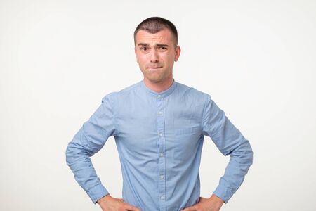 Thoughtful hispanic young man trying to fina a right solution generating idea