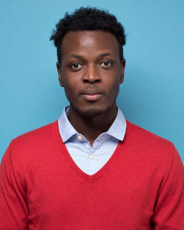 Portrait of real black african man with no expression for ID or passport photo.の写真素材