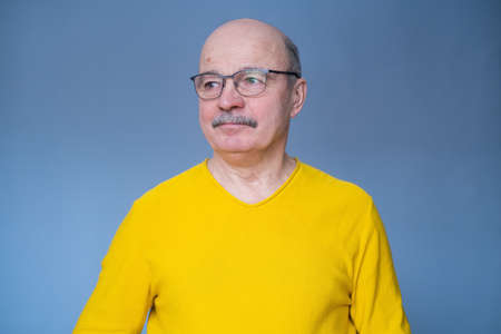 Senior hispanic man trying his new glasses.