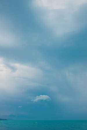 blue sea and cloudy sky on sunny summer day.の写真素材