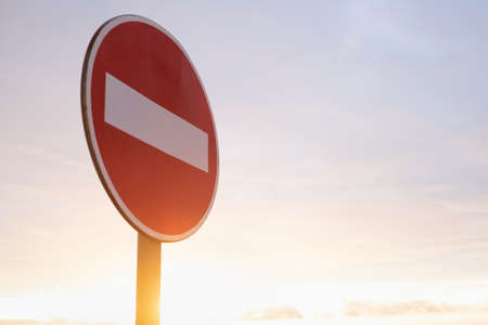 Stop sign on blue sky. It is not permitted to drive there.の写真素材