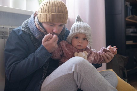 Man wearing warm clothing feeling cold . Energy crisis in Europe