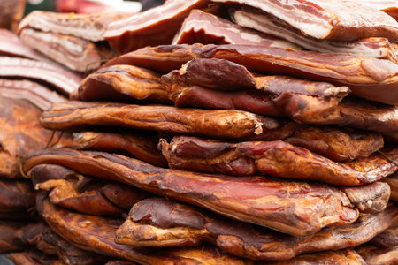 Pieces of salty high-fat meat in a shop. Salo or bacon. tasty meat.の写真素材