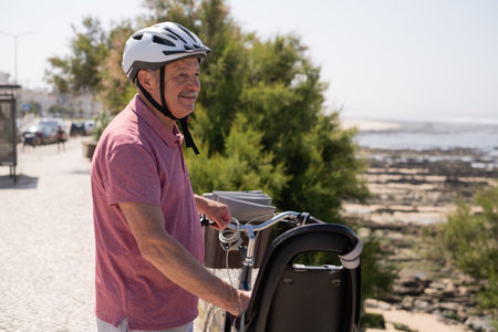 Elderly Man with Mustache and Helmet Riding a Bicycle