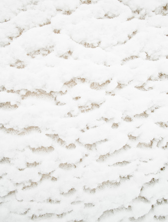 Snow piled up on burlapの写真素材