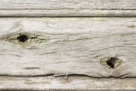 background of old wooden board with peeling paint outdoorsの写真素材