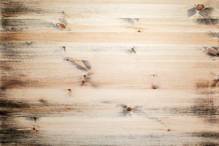 Natural wood surface with black paint residues. Copy space. Advertisement. Background.の写真素材