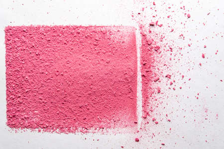 Bright red frame made of colorful powder on a white background. Copy space. Top view.の写真素材