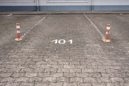 Parking space with number 101, a rapid learning driving schoolの写真素材
