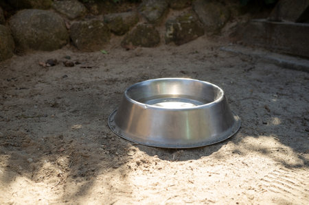 dog bowl of water in a public place for visitors with animalsの写真素材