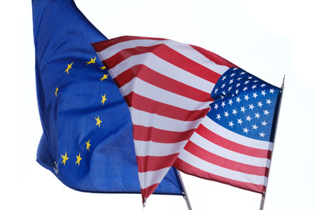 Waving flags of the European Union and the United Statesの写真素材