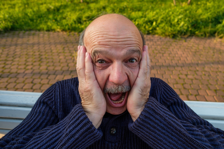 Portrait of shocked caucasian man.