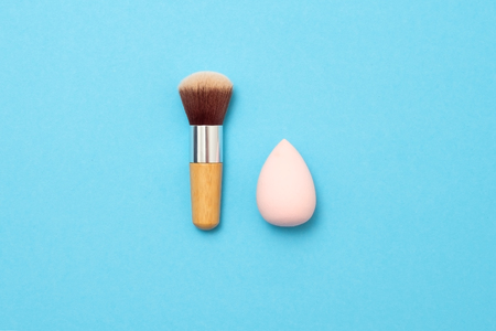 New natural brush on blue background for women make up concept.の写真素材