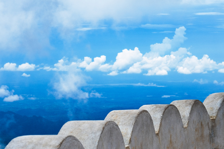 White fence against cloudy sky at Lipton seat at hills in Sri Lankaの写真素材