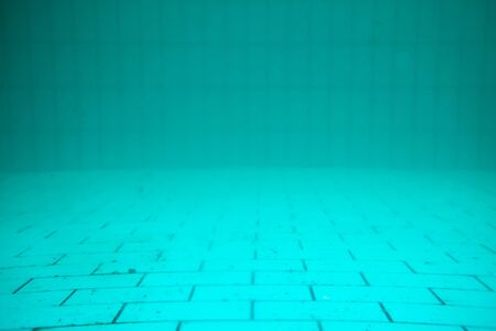 Under blue water in the swimming pool.の写真素材
