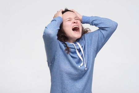 student screams desperately, being angry as fails exam, being irritated and aggressive.の写真素材