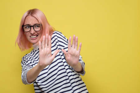 Woman expressing no gesture with hand. I refuse to do it