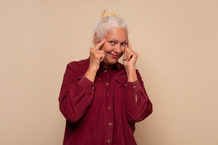 Senior caucasian woman generating idea trying to plan making right stragedy.