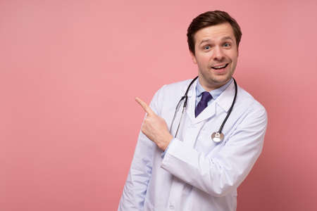 Male doctor makes a pointing finger gesture,の写真素材
