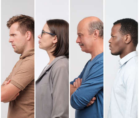 Side view portrait of several people male and female looking seriously aside.の写真素材