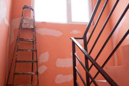 Repairing and painting walls in the house.の写真素材