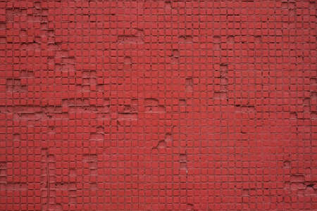 Red checkered pattern texture with missing blocks.の写真素材