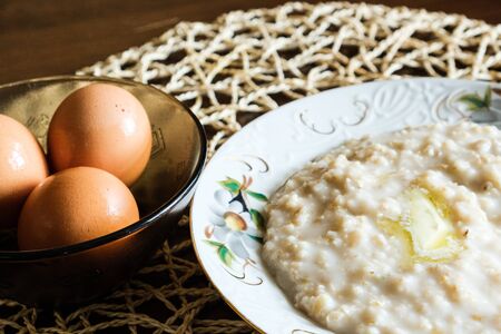 morning breakfast kitchen fresh natural food oatmeal and boiled egg