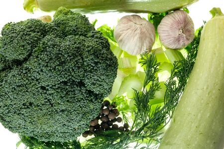 green cabbage broccoli celery zucchini garlic natural food isolated on white backgroundの写真素材