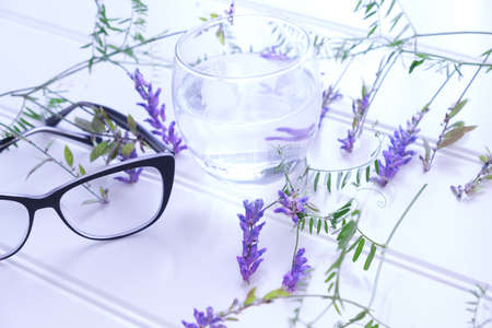 financial manager business accessories for office work glasses calculator flowersの写真素材