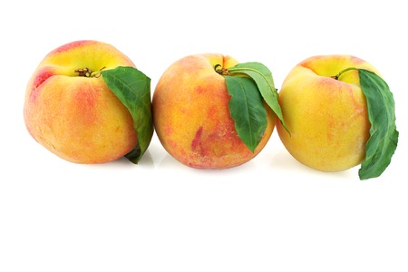 peaches sliced on white backgroundの写真素材