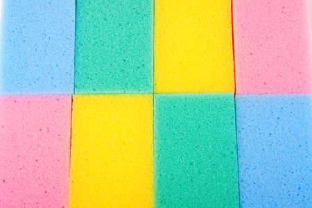 Background of colored kitchen sponges for washing dishes.の写真素材