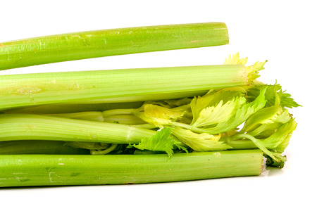 fresh green celery isolated on white background.の写真素材