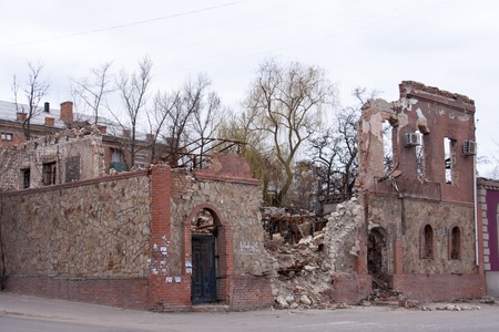 LUGANSK ,UKRAINE - MARCH 25, 2016:  The destroyed building after a mortar attack.のeditorial素材