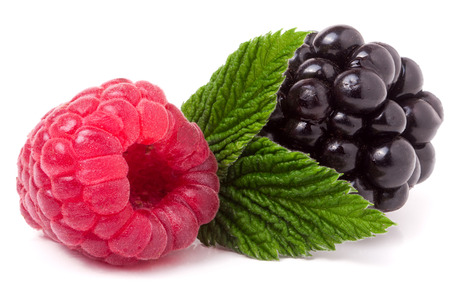 raspberries and blackberries with leaf isolated on white background.