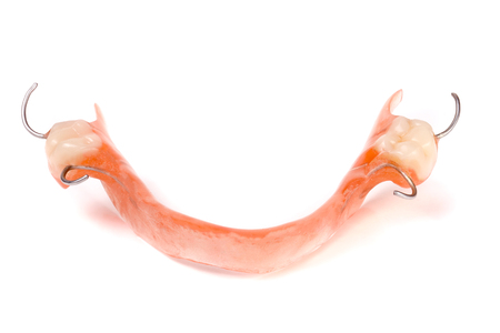 removable partial denture isolated on white background.
