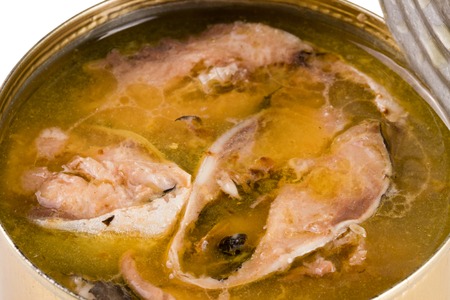 open tin can with fish pilchard close-up macroの写真素材