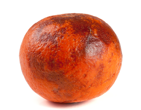 one damaged tangerine isolated on white backgroundの写真素材