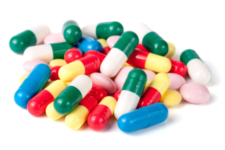 colorful pills isolated on white background