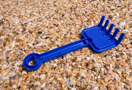 childrens toys on the beach a sunny day