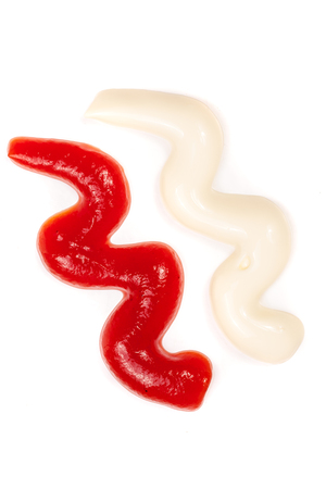 Tomato ketchup and mayonnaise isolated on white background. Top view.の写真素材
