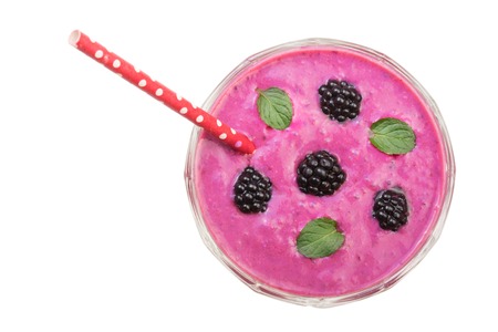 blackberry yogurt or smoothie with mint leaves isolated on white background. Top view. Healthy Eatingの写真素材