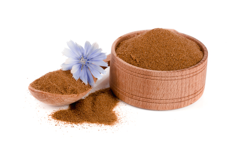 chicory flower and powder of instant chicory isolated on a white background. Cichorium intybus.の写真素材